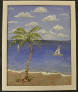 Beach scene with palm tree and sail boat